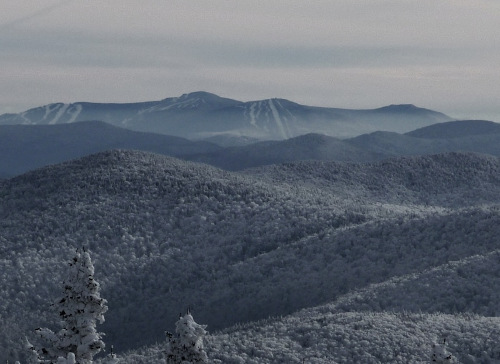 green mountain in vermont covered in snow