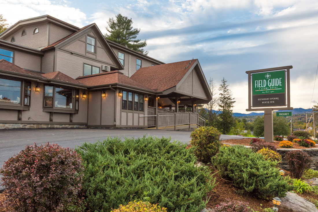 Field Guide Lodge in Stowe, VT at the front of the lodge